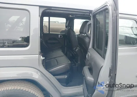 2022 Jeep Wrangler 4Xe Unlimited Sahara 4X4 z USA, uszkodzony, nr VIN 1C4JJXP68NW214467